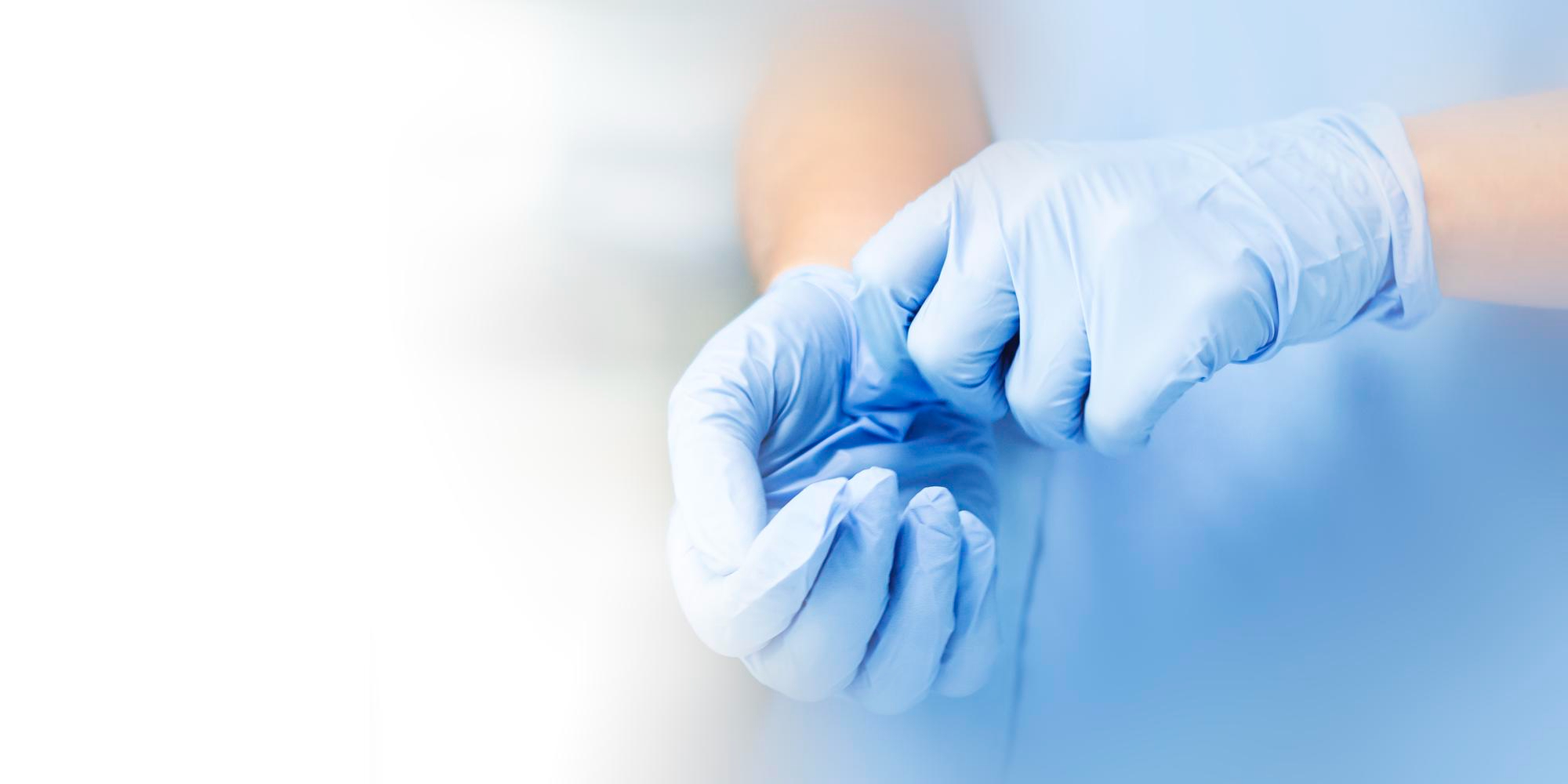 Medical professional hands with gloves